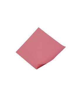 Pink folded sticky note isolated on a clean background