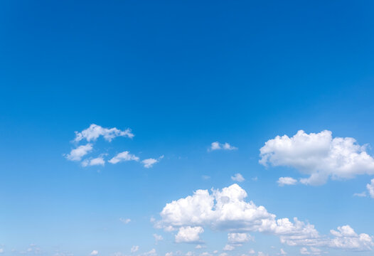 clear blue sky background,clouds with background, Blue sky background with tiny clouds. White fluffy clouds in the blue sky. 