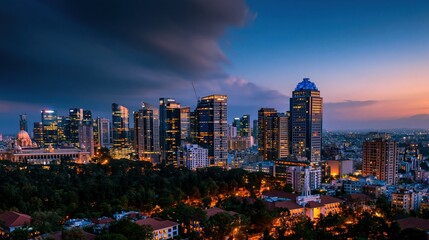 Naklejka premium Dramatic evening sky above illuminated city skyline with modern office buildings and lush green trees for corporate website background, urban real estate and travel advertising