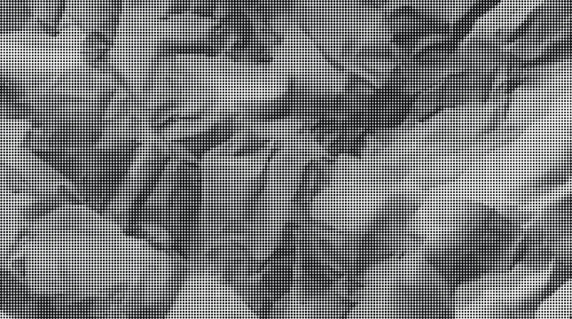 A close-up view of crumpled paper sheets fills the frame.