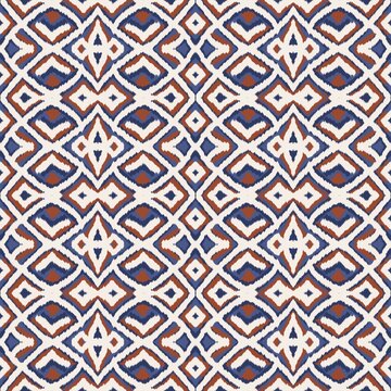 Seamless ethnic ikat pattern with intricate slate blue and terracotta geometric motifs. Detailed tribal design perfect for bohemian fabric prints, wallpaper, and creative background decor.