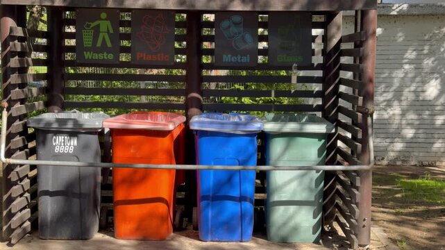 Wheelie Bins for recycling waste, bottles, cardboard and organic waste.