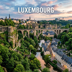Naklejka premium Panoramic aerial view of Luxembourg City, historic bridge, and lush green scenery 