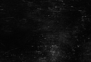 Fototapeta premium Old black stucco wall with white scratches and scuffs texture. textured grunge black board with chalk
