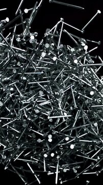 The nails fly up and fall down. Filmed on a high-speed camera at 1000 fps. High quality FullHD footage