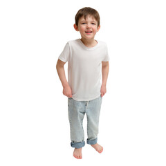 Fototapeta premium Smiling little boy in casual white t-shirt and light blue jeans. Happy child standing isolated on transparent background. Childhood, joy and innocence concept in studio portrait. A kid aged 4 years