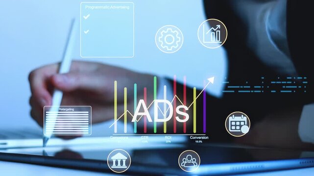Business professional working on digital advertising strategies with data analysis and planning tools.