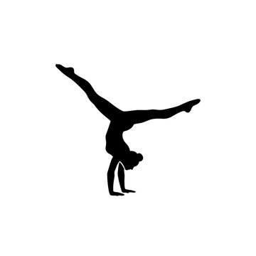 Silhouette of a gymnast performing a handstand split.