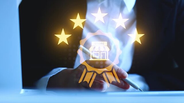 Business owner holding pen and looking at screen with stars and store logo showing quality rating.