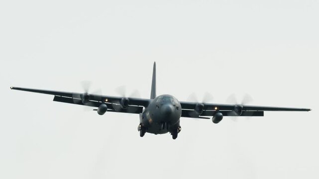 Military Transport Plane Delivering Troops and Cargo During Flight