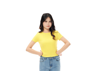 Obraz premium Confident young woman standing with hands on hips