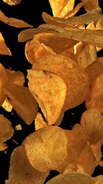 Potato chips fly up and fall down. Filmed on a high-speed camera at 1000 fps. High quality FullHD footage