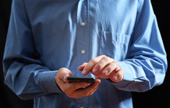 Person hands using mobile phone for communication
