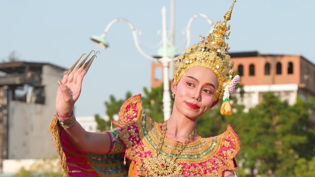 Thai Classical Dancer Performs Manohra Dance in Traditional Costume at Wat Suthat