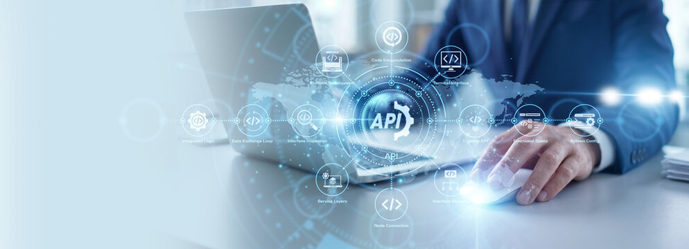 Software developer working on laptop, API integration and web development. Application programming interface and data exchange. Coding and backend system connecting different digital platforms.