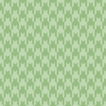 Elegant pale green houndstooth pattern.  Perfect for textile design, wallpaper, website backgrounds, or any project needing a sophisticated geometric texture.