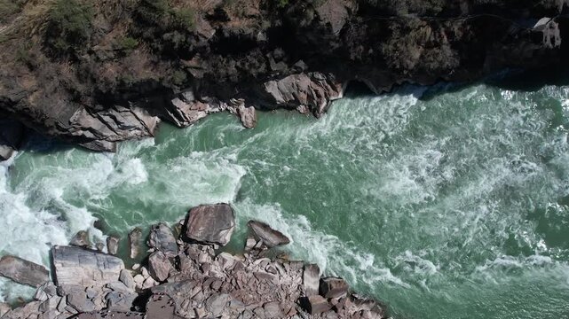 4K aerial video overlooking the river water of Jinsha River Tiger Leaping Gorge