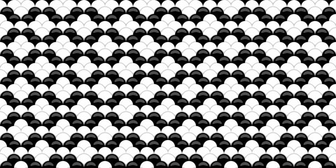 Stylish black and white geometric pattern.  Abstract seamless design with overlapping scales, ideal for backgrounds, textiles, or website design. © Olena