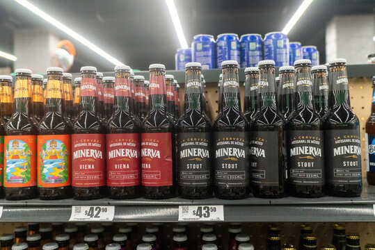 Villa de Alvarez, Colima. Mexico. May 18, 2026: Mexican craft beers from the Minerva brand on a shelf.