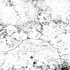 Fototapeta premium Close-up cracked white concrete surface with irregular black fissures and speckles, distressed aged texture background for design, geology, or artistic use