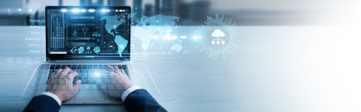 IT specialist working on laptop Cloud Computing networks to host scalable web services and databases. Remote server management provides flexible storage solutions for modern global teams.