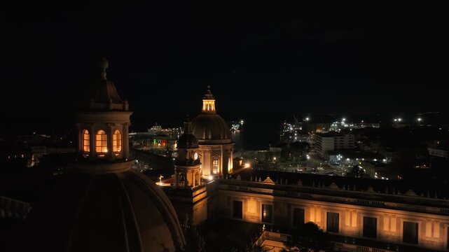 Aerial View of Metropolitan Cathedral of Saint Agatha at NIght, Catania Sicily Italy City Center in Lights