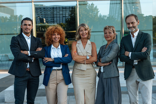 Diverse business professionals team standing confident outdoors