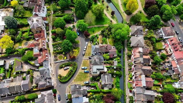 Aerial top-down pull-away shot revealing Enfield Town with New River and Saint George&rsquo;s Cathedral