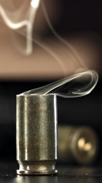 Smoke from the cartridge case after the shot. Filmed on a high-speed camera at 1000 fps. High quality FullHD footage