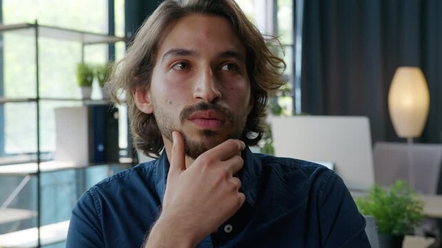 Thinking Hispanic business man in office Arabian businessman think Arabian guy male manager solving work job problem pensive decide idea working strategy creating entrepreneur holding chin hesitate
