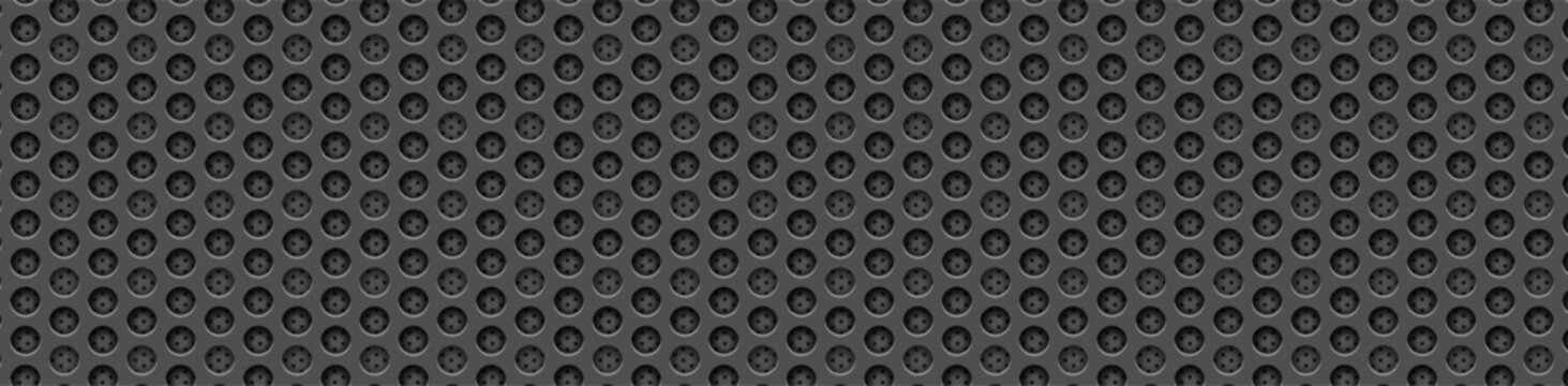 Micro perforation metal background dark black dotted carbon texture.