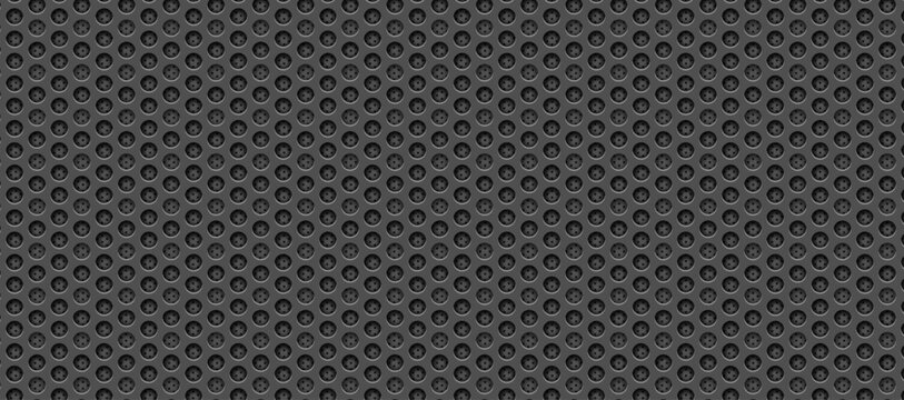 Dark perforated metal background, circular hole black pattern.
