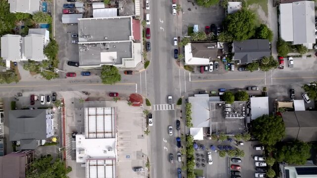 Traffic at a downtown intersection in Folly Beach, South Carolina with overhead drone video.
