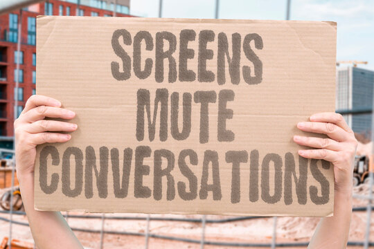"Screens Mute Conversations" Phones interrupt nearby human moments. DETACHMENT. DISTRACTION. ISOLATION. DIGITAL. SILENCE.