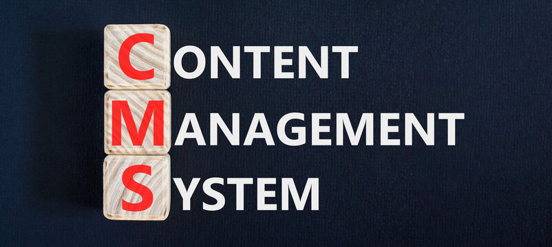 CMS content management system symbol. Concept words CMS content management system on beautiful wooden blocks. Beautiful black background. Business CMS content management system concept. Copy space.