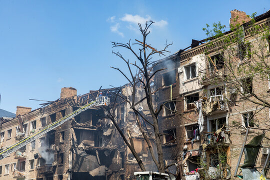 Emergency Responders Addressing Damage In Kyiv Residential Building