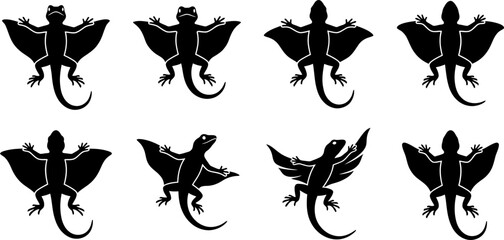 Set of black silhouettes featuring flying dragons or gliding lizards in various poses for creative design projects © Vecto_Pixels