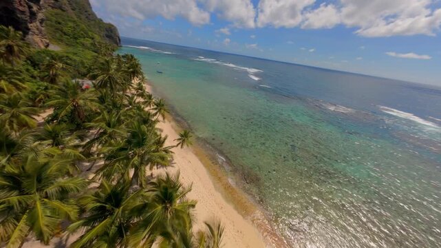 Fpv of Fronton beach with blue sea in Las Galeras Samana, Dominican Republic