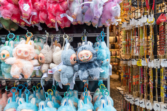 Turkey, Istanbul, May 20, 2026 Colorful Labubu toys hang on display in a busy market filled with various accessories and crafts