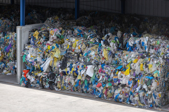 Stored plastic waste prepared for recycling and material recovery