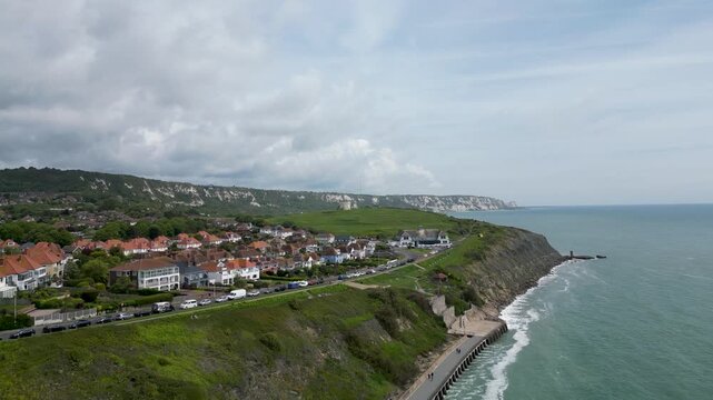 4K Aerial Drone View of Folkestone Cliff Top Houses White Chalk Cliffs and Coastal Promenade Kent UK