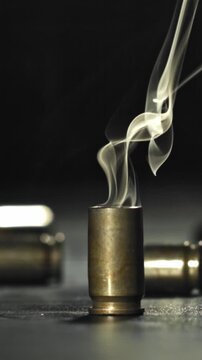 Smoke from the cartridge case after the shot. Filmed on a high-speed camera at 1000 fps. High quality FullHD footage