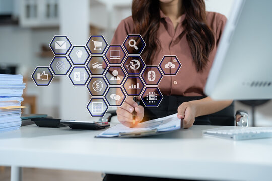 Business woman hand Project manager working and update tasks and Gantt chart scheduling virtual diagram.with smart phone, tablet and laptop in office.
