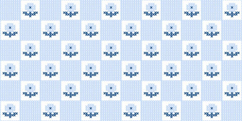 Seamless light blue cross stitch pattern featuring floral motifs in a checkered grid. © oxygen_8