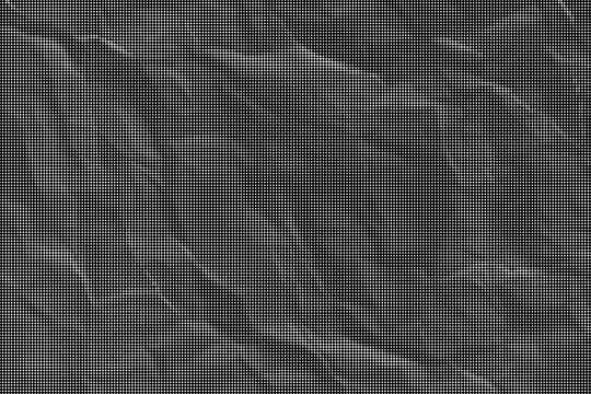 A close-up view of a crumpled fabric texture on a plain surface