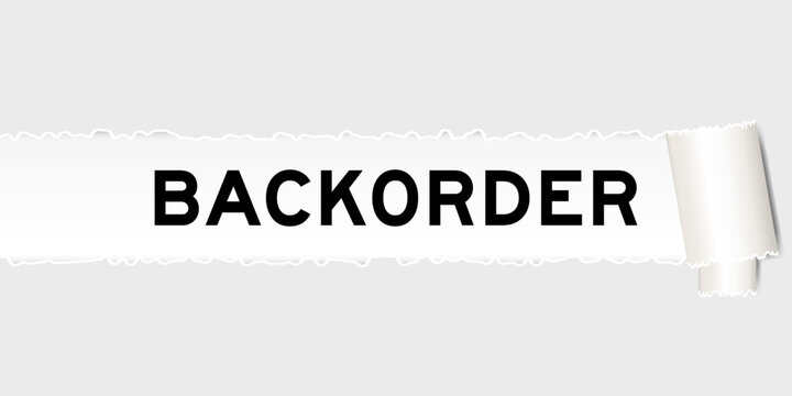 Ripped gray paper background that have word backorder under torn part