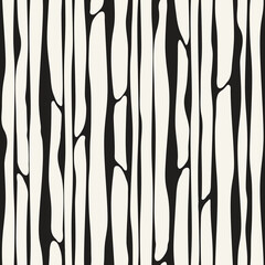 Fototapeta premium Vector seamless pattern. Free form organic shapes. Stylish smooth weaving structure. Natural zigzag spots. Hand drawn abstract background. Can be used as swatch. Monochrome spotty print.