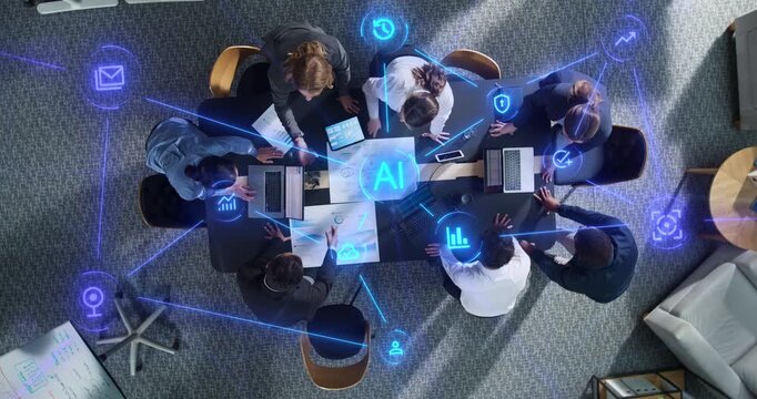 Top Down View of Diverse Business Team Gathered Around Meeting Table With Laptops and Statistical Reports. Visualization Icons Represent Connectivity, Cloud Security. Action Zoom out camera.