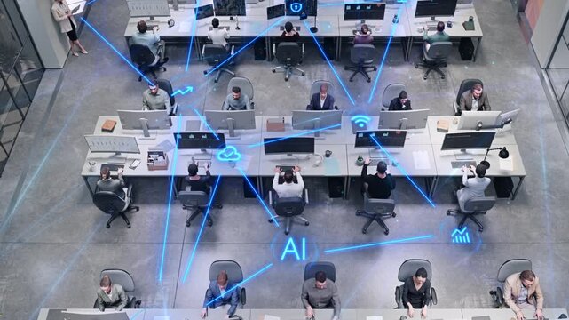 Top down View of Multiracial Office Workers Performing Data Work in  Office, as Blue AI Network Lines, Cloud, Wi-fi, Growth and Security Icons Link Computers Across Long Desks.
