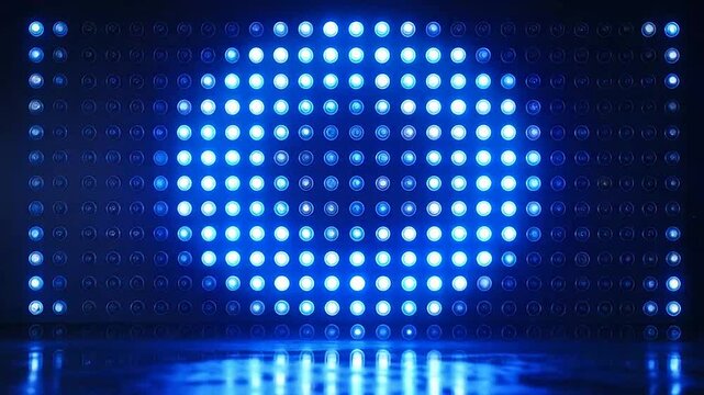 A grid of bright blue light emitting diodes glows against a dark background